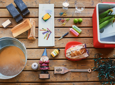 Overhead of a picnic table with everything you need for backyard fun.