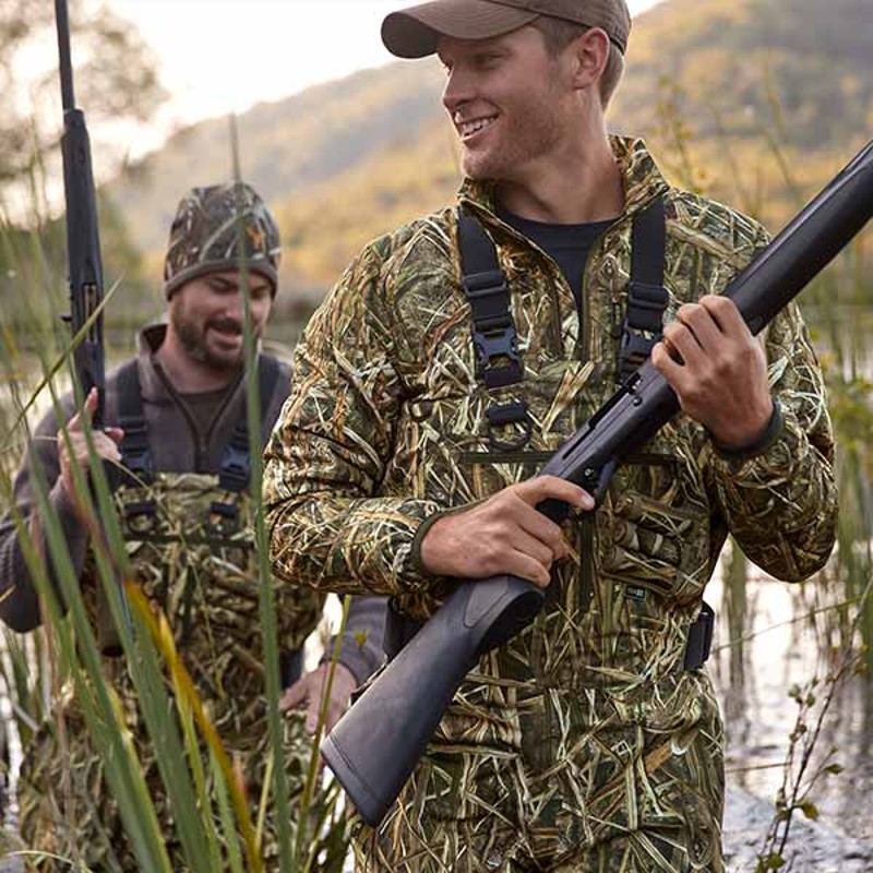 Two men bird hunting.