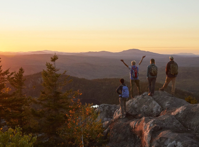 Photo of a group of people outside hiking