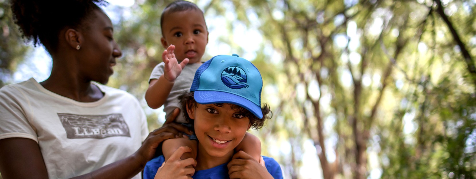 A family enjoying a hike together outside.