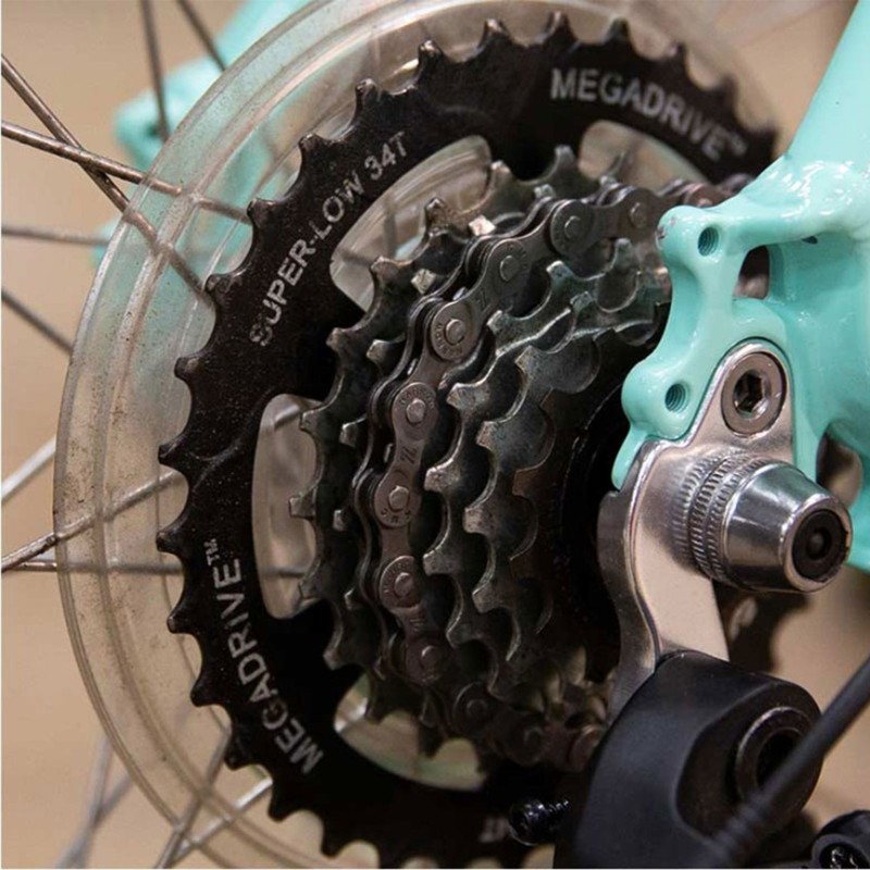 Close-up of a bicycle derailleur and chain.