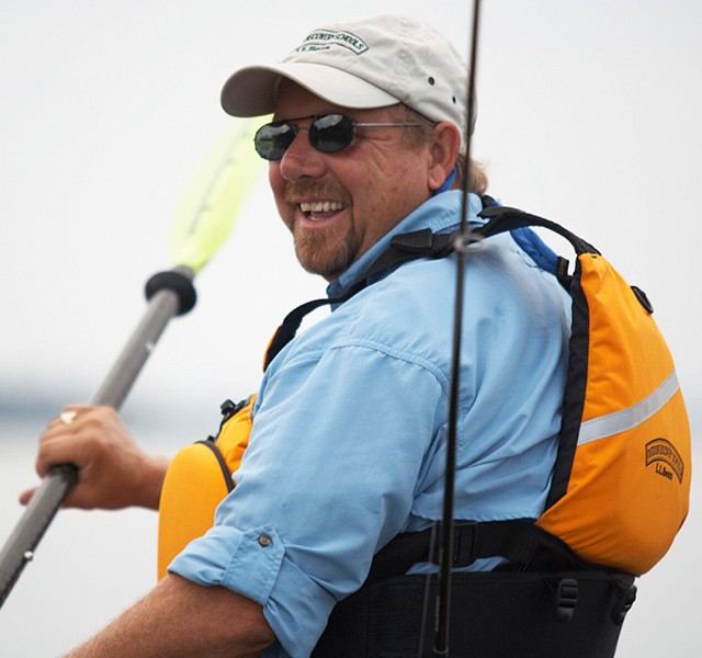 Robert Chase paddling a kayak