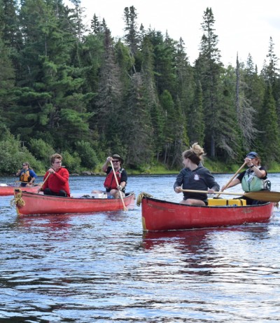 Image of people in canoes.