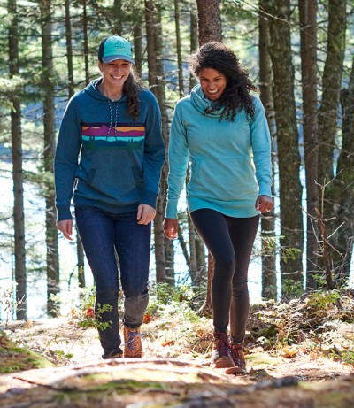 Photo of people hiking in the woods.