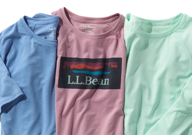 Close-up of 3 different colored tee shirts.