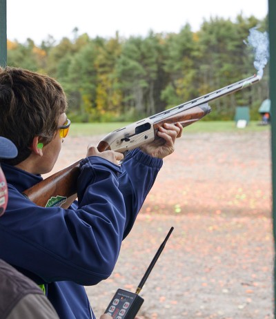 Group of men clay shooting