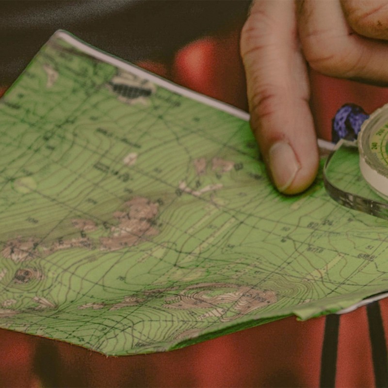 A person holding a map.