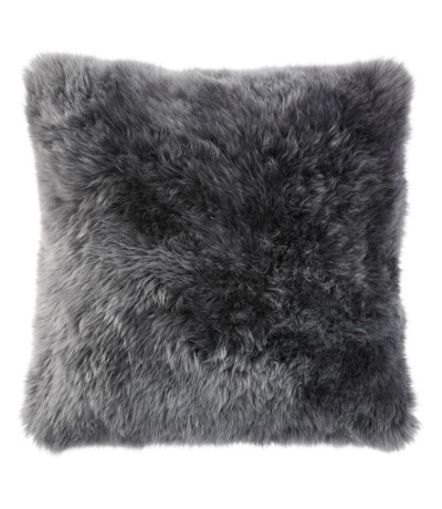 A gray sheepskin throw pillow.