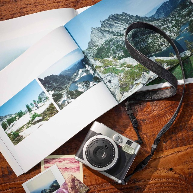 A camera and photo book are ways to document national park visits.