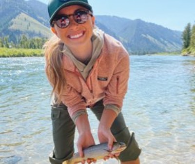 woman holding fish