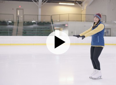 Wyoma demonstrating beginner ice skating technique.