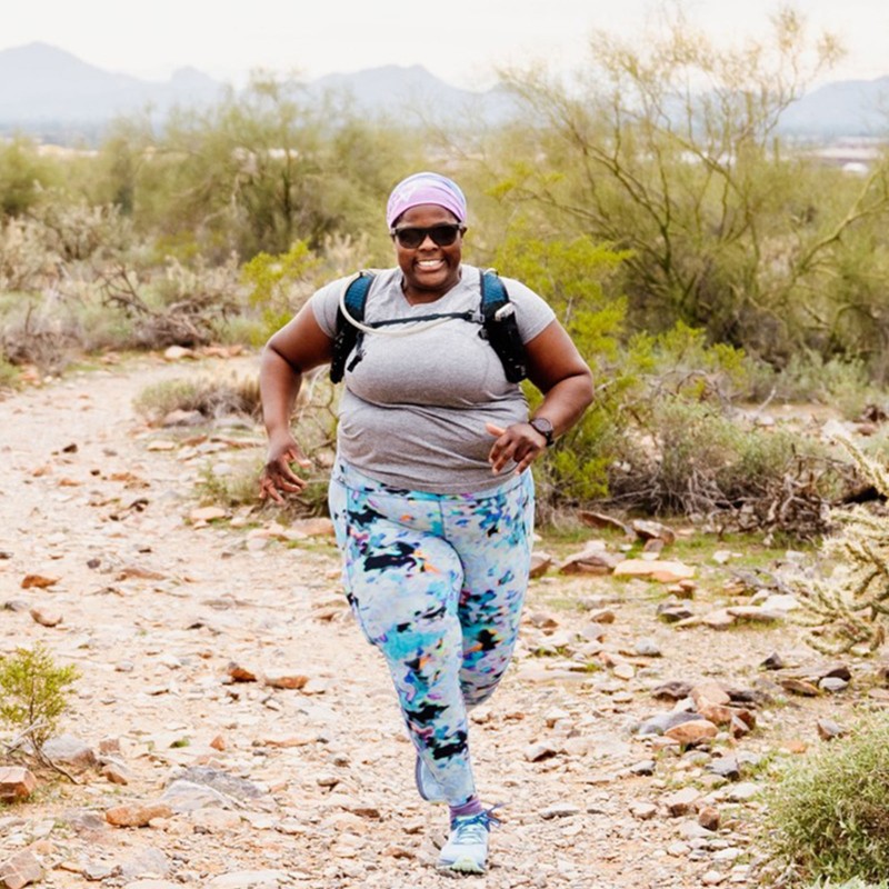 L.L.Bean Ambassador, Mirna Valerio, running on a desert trail.