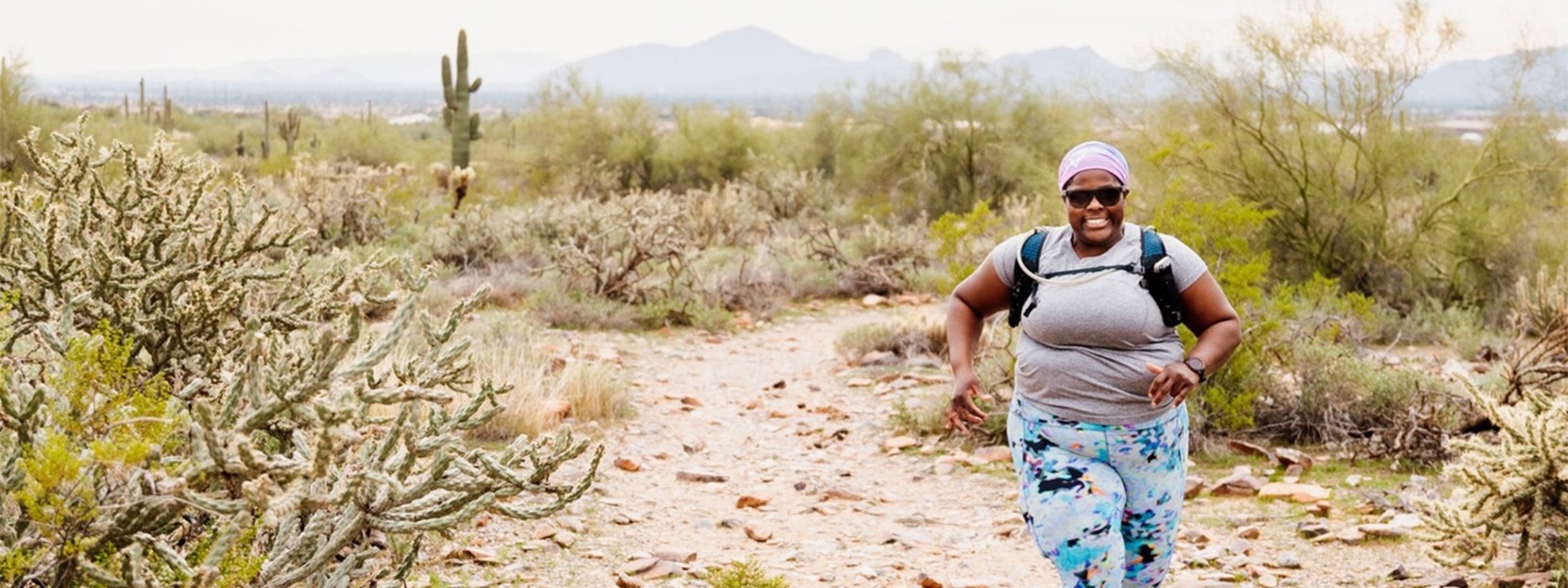 L.L.Bean Ambassador, Mirna Valerio, running on a desert trail.