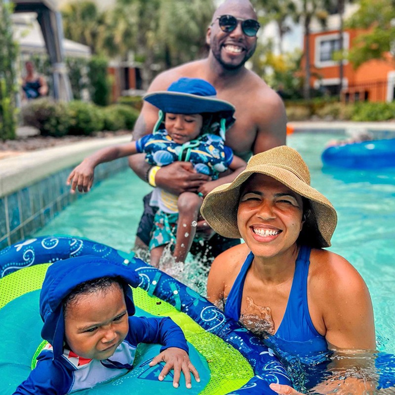 The Brooks family in a pool.