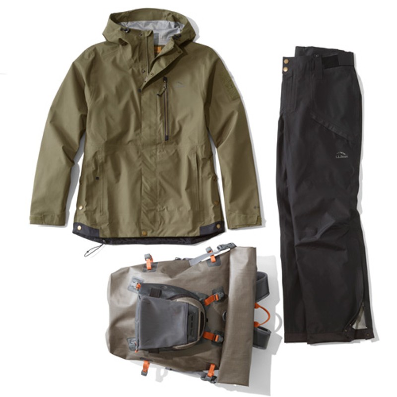 A laydown of clothing needed for fishing in rainy weather.