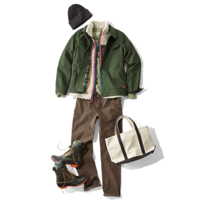 A laydown of an outfit featuring a fleece vest under a jacket, propped with a knit hat and a tote.