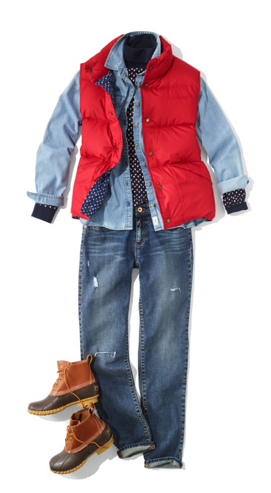 A laydown of an outfit featuring a red down vest.