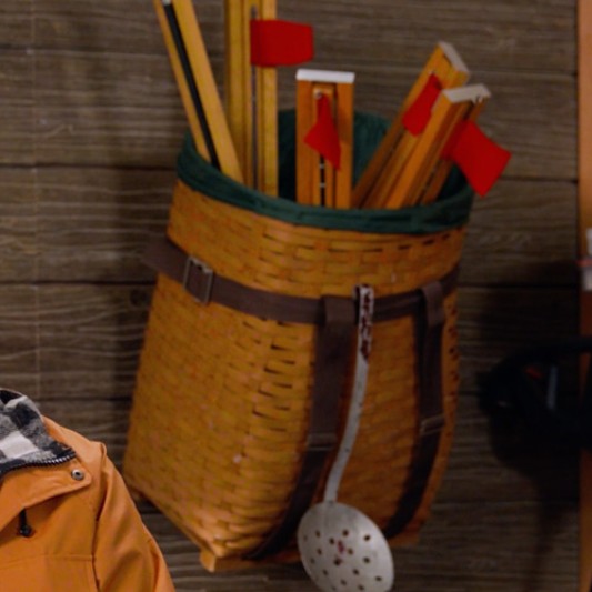 A pack basket filled and ready to go ice-fishing.