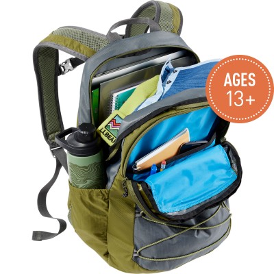A Comfort Carry Laptop Pack, 30L, open to show contents, a circle with text "Ages 6+."
