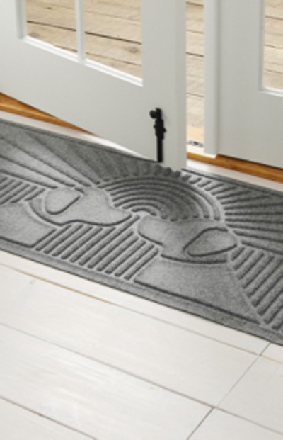 Image of a doormat at the front entrance of a house