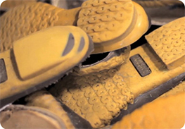 A pile of bean boot soles ready to be reattached.
