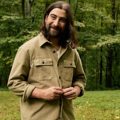 Noah Kahan wearing an L.L.Bean & Noah Kahan chamois shirt.