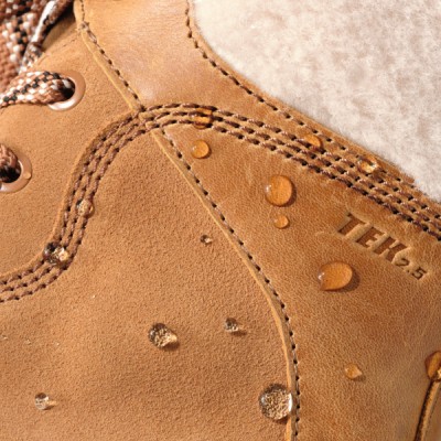 Water droplets bead up on the side of the boot indicating it's waterproofing qualities.