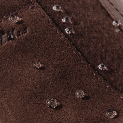 Water beads up on the outer leather showing the boot's waterproofness.
