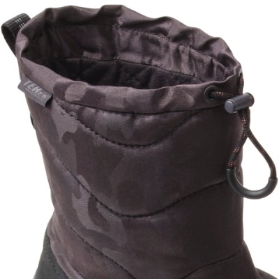 A detail of the boot showing the heel tab, toggle closure and molded heel clip.