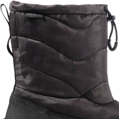 Detail showing the plush, quilted recycled polyester upper and fleece lining.
