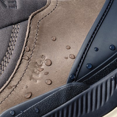Water drops bead up on the side of the boot demonstrating it's waterproofness
