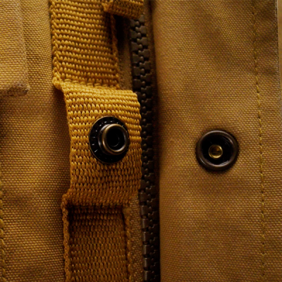 A close up detail shot of a jacket's shoulder area complete with L L Bean logo