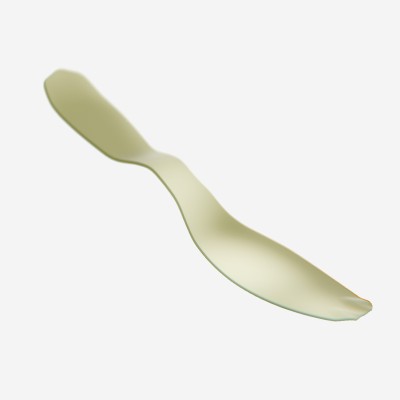 A beige rock plate and rubberized toe which makes up part of a boot.