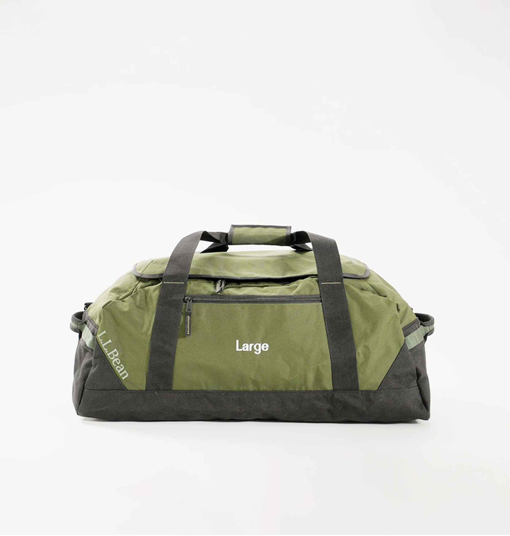 Side view of a large, green Adventure Duffle on an eggshell white background.