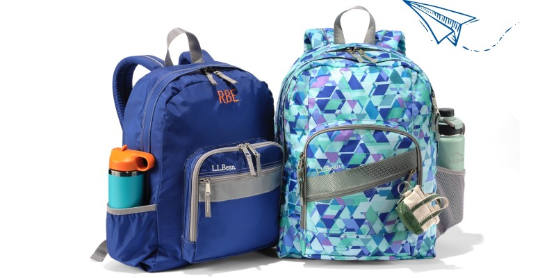 Solid blue L. L. Bean school backpack and printed blue L. L. Bean school backpack with water bottles in the side pockets.
