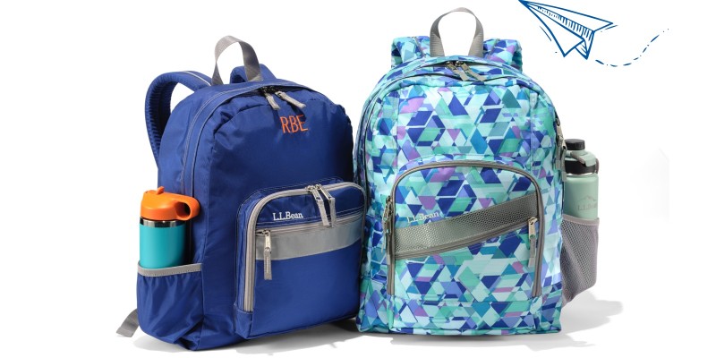 Solid blue L. L. Bean school backpack and printed blue L. L. Bean school backpack with water bottles in the side pockets.