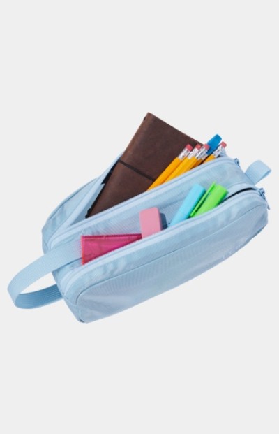 An organizer pouch shown from above open to show contents of pens, pencils, eraser, etc.
