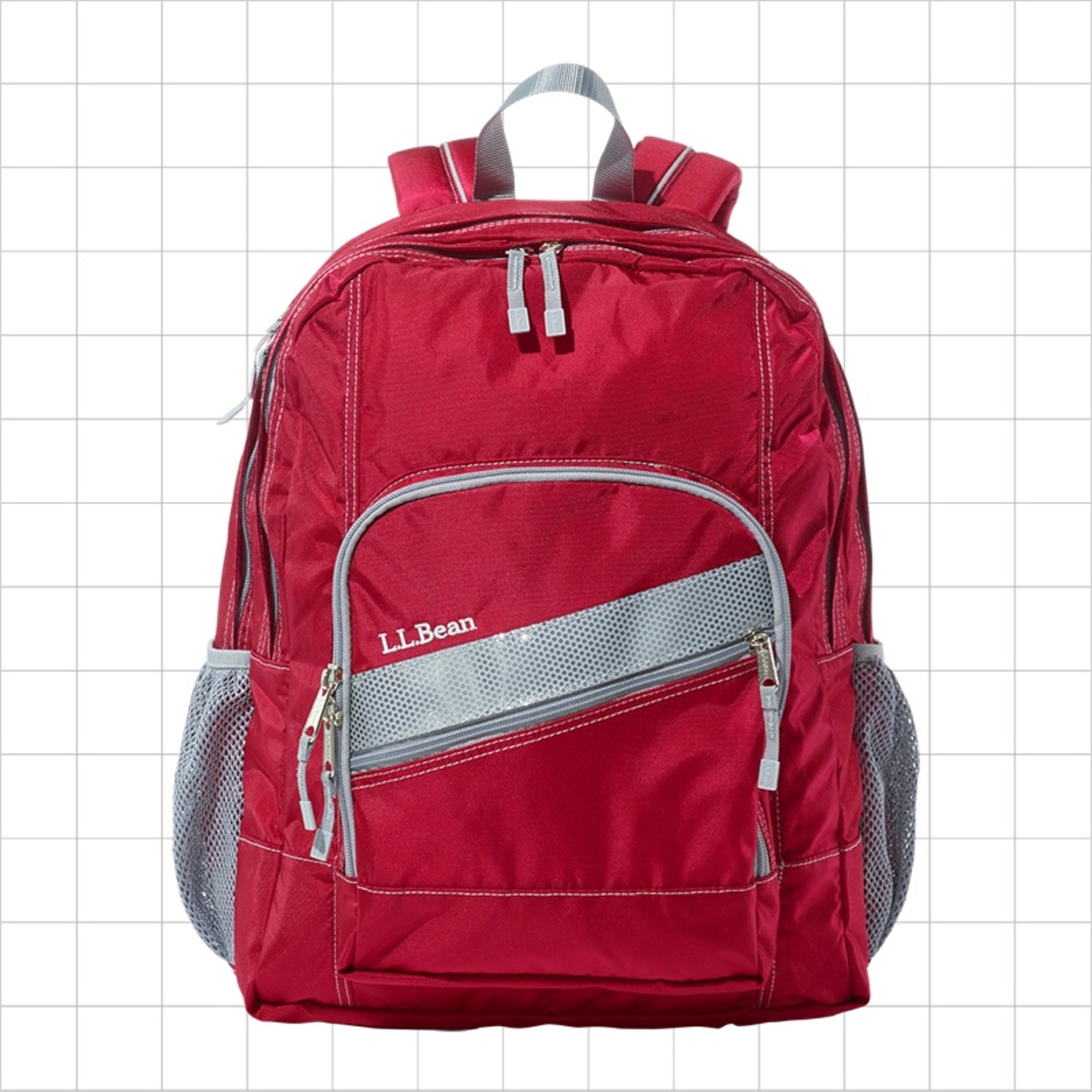 A red school backpack with a diagonal reflective strip on the front pocket.
