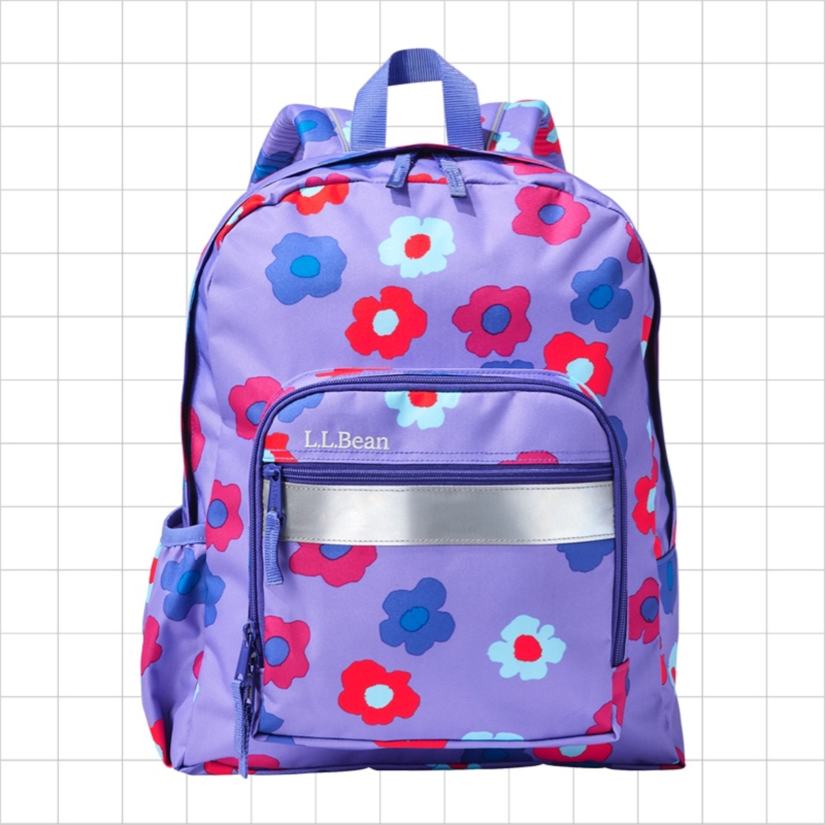 A purple flower print school backpack with a reflective strip on the front pocket.