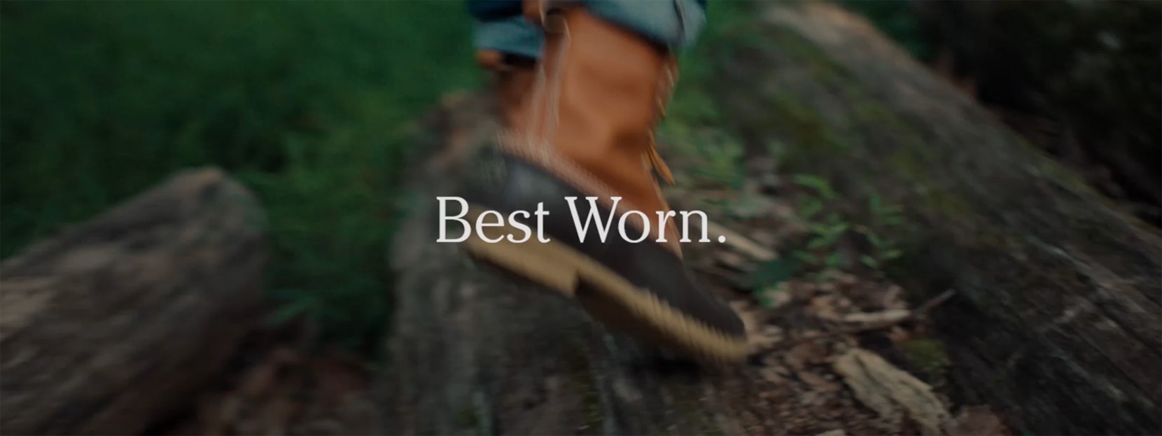 A person hiking wearing L L Bean Boots with text "Best Worn.". 