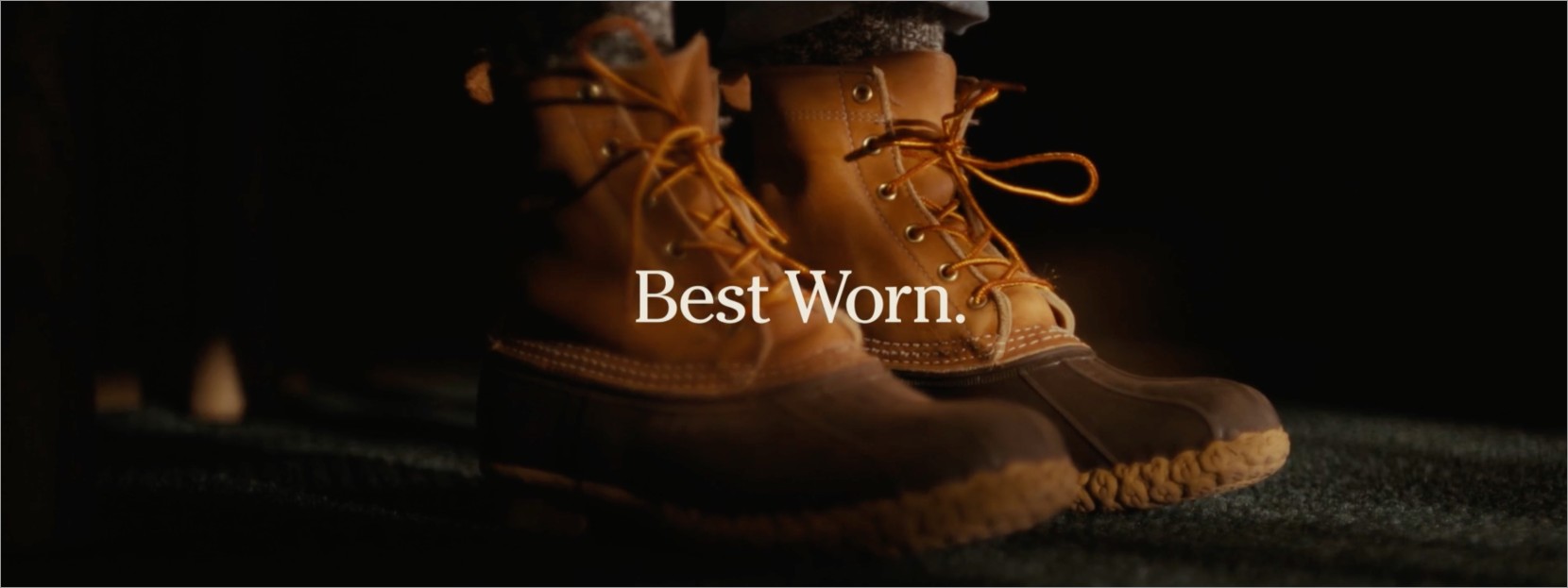 A person hiking wearing L L Bean Boots with text "Best Worn.". 
