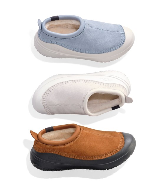 Three slip-on shoes in blue, white, and brown with soft fleece lining displayed on a white background.
