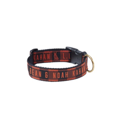 A plaid dog collar with the text "L. L. Bean & Noah Kahan" printed on it.