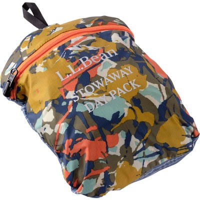 A multi colored L L Bean Stowaway Day Pack with a zipper and a white mountain logo.