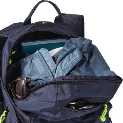 A blue pack is open, revealing a blue jacket, sunglasses, and an electronic device.