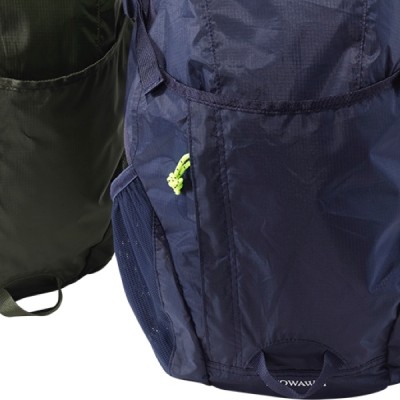 A blue backpack's shove it side pocket and neon green zipper pull.