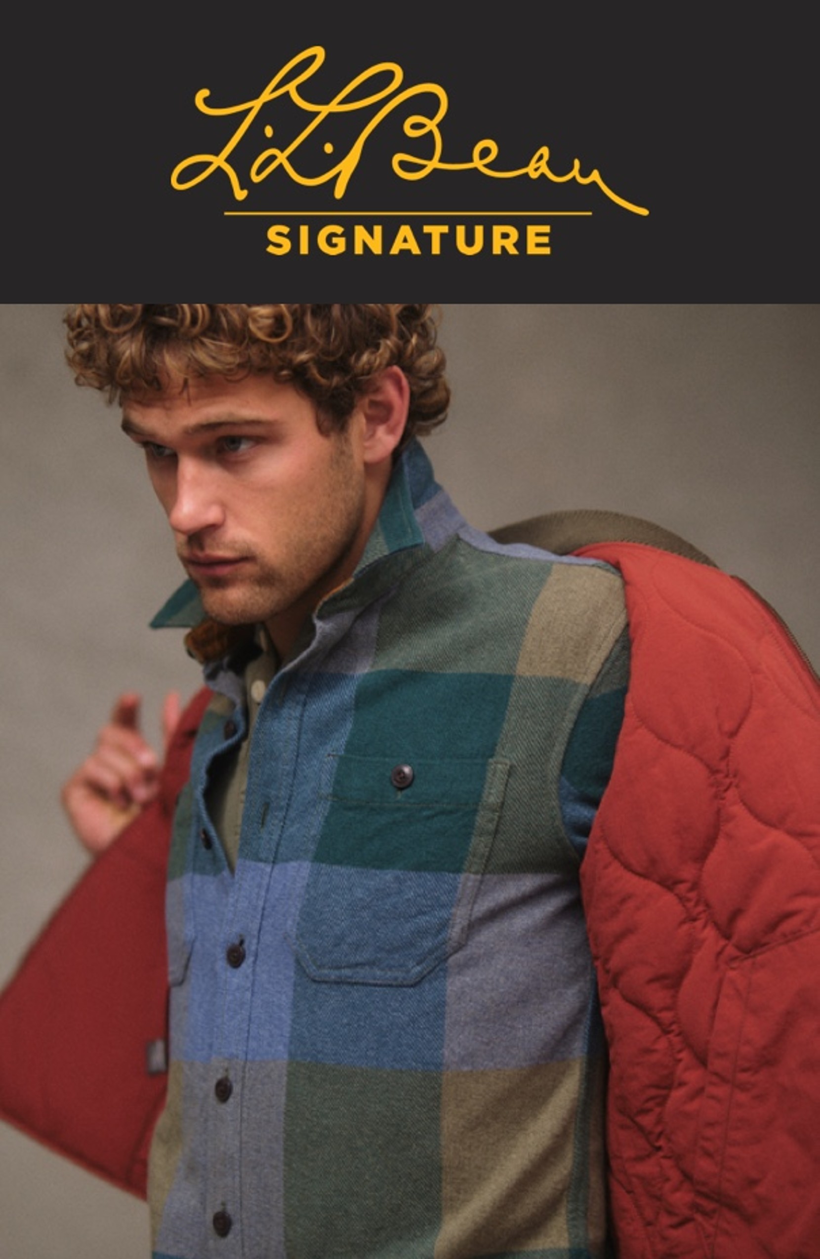 A man in a plaid shirt and taking off a vest and the L. L. Bean Signature logo.