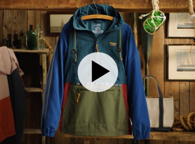 Video thumbnail showing a multicolor L L Bean anorak hanging in a rustic outfitter-inspired display space.