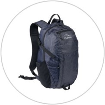 A backpack inside a light gray circle.