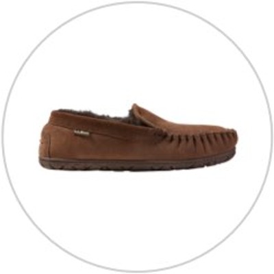 A brown Wicked Good Slipper Moc inside a light gray circle.